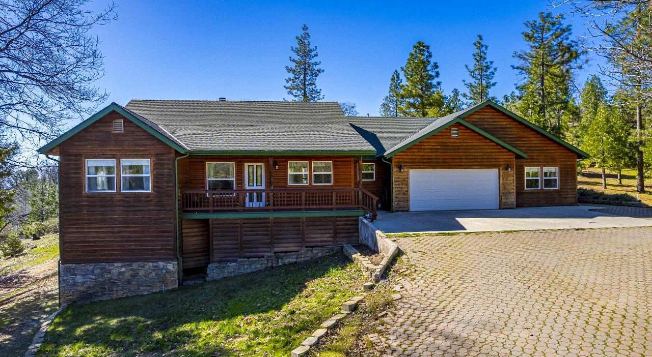 53312 Timberview Road North Fork, CA 93643 - Photo 82 of 84 a front view of a house with a yard
