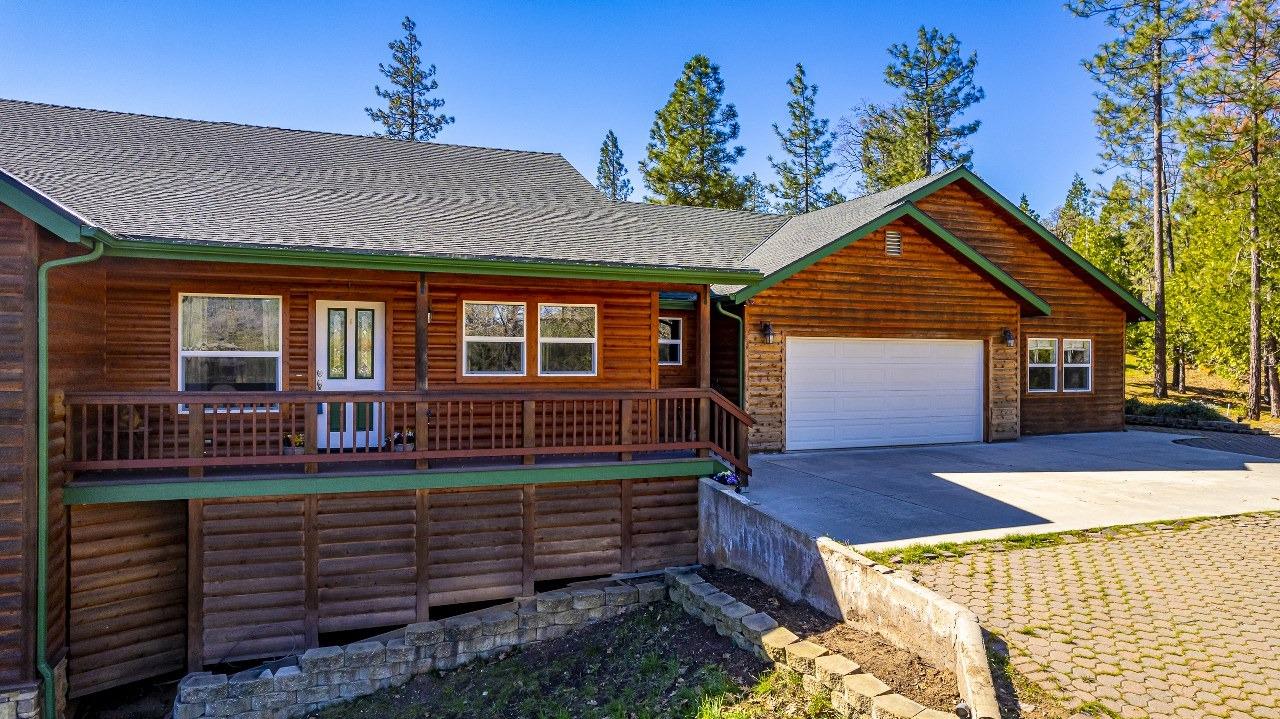 53312 Timberview Road North Fork, CA 93643 - Photo 84 of 84 a front view of a house with garden