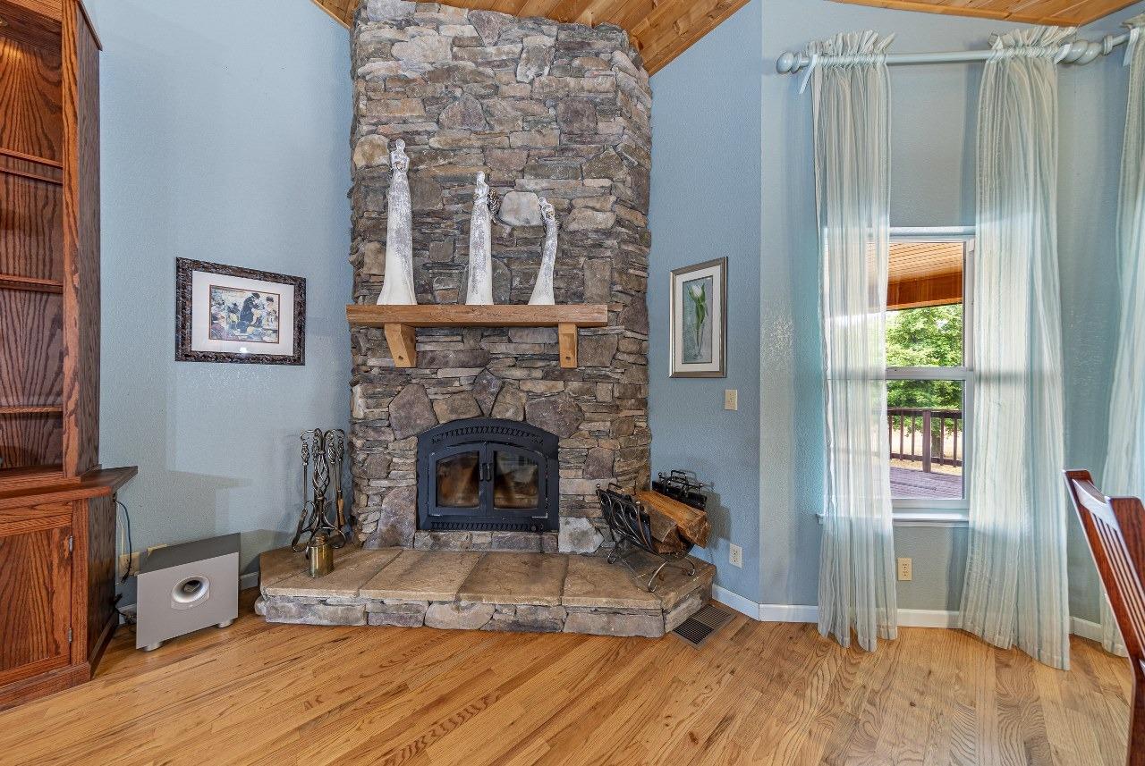53312 Timberview Road North Fork, CA 93643 - Photo 10 of 84 a living room with furniture and a fireplace