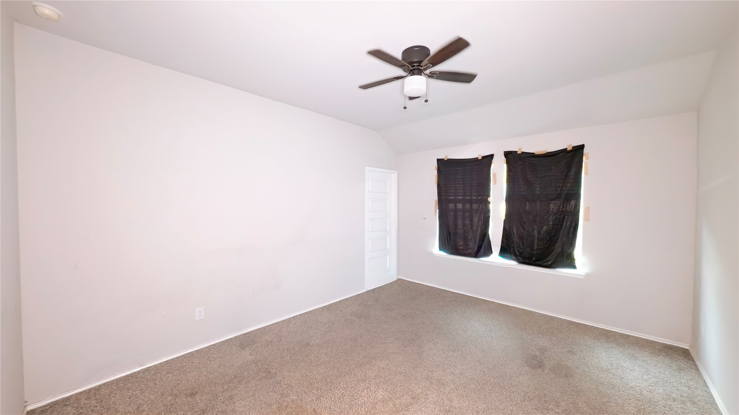 8522 Sacred Lotus Lane Rosharon, TX 77583 - Photo 4 of 11 an empty room with a window