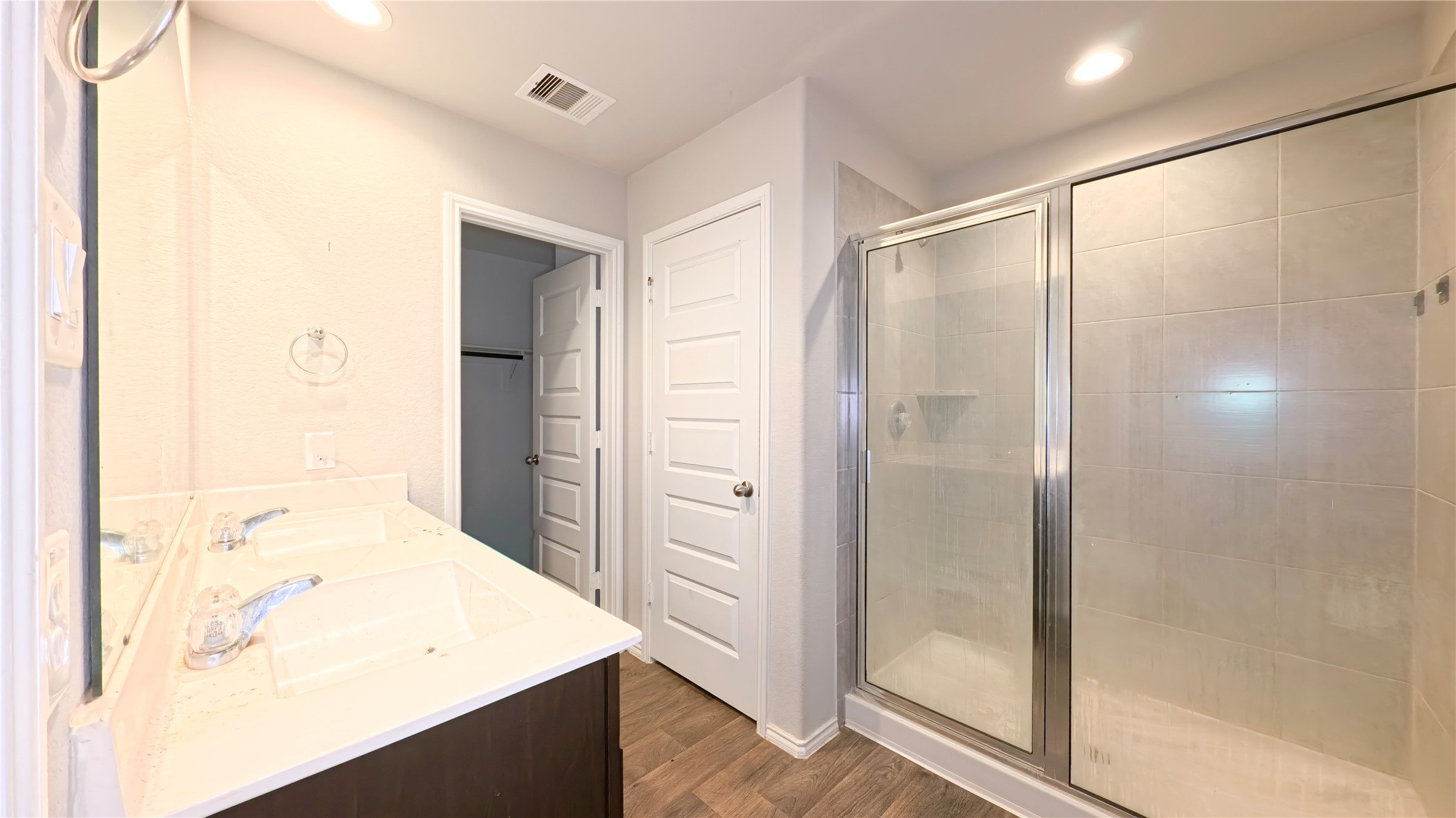 8522 Sacred Lotus Lane Rosharon, TX 77583 - Photo 10 of 11 a bathroom with a shower and a sink