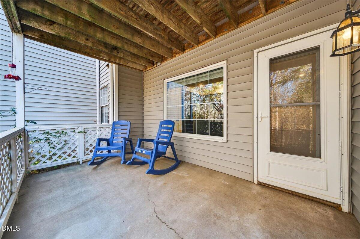503 Gooseneck Drive, Unit A1 Cary, NC 27513 - Photo 24 of 37 a view of a room with lounge chairs and windows