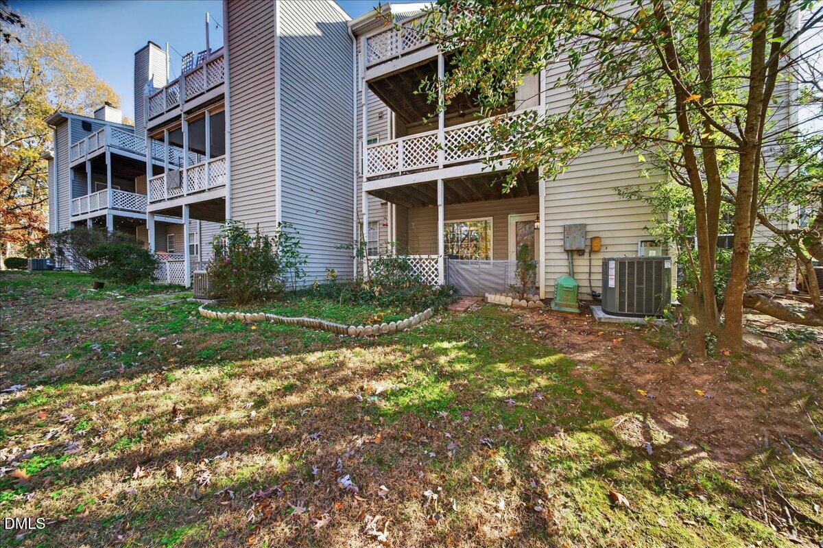 503 Gooseneck Drive, Unit A1 Cary, NC 27513 - Photo 27 of 37 front view of a house with a yard