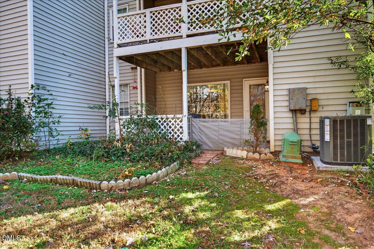 503 Gooseneck Drive, Unit A1 Cary, NC 27513 - Photo 28 of 37 a front view of a house with garden