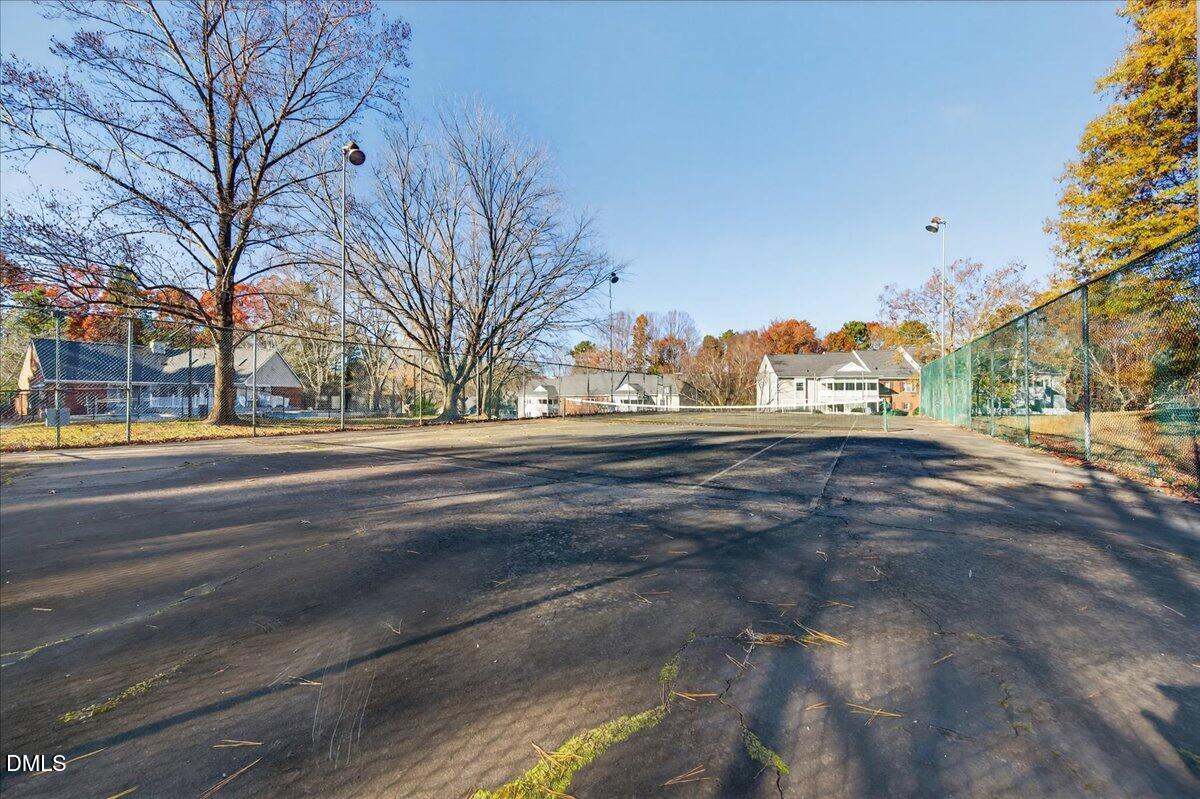 503 Gooseneck Drive, Unit A1 Cary, NC 27513 - Photo 30 of 37 a street view with large trees