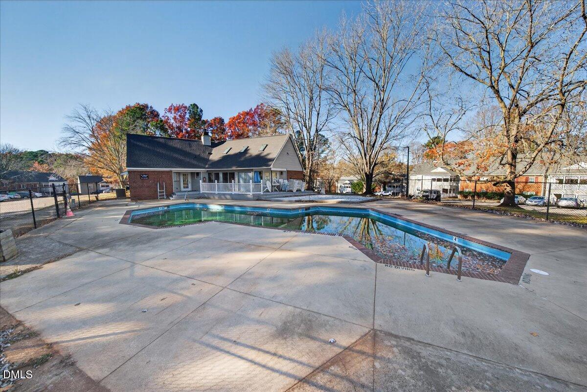 503 Gooseneck Drive, Unit A1 Cary, NC 27513 - Photo 32 of 37 a view of a street with houses on both side