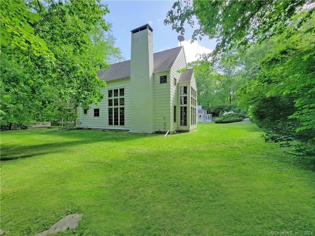 22 Ketcham Road Ridgefield, CT 06877 - Photo 5 of 40 a view of a house with backyard