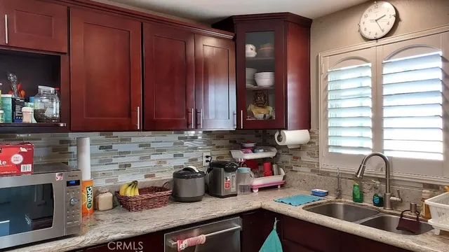 a bathroom with a sink a vanity and a bathtub