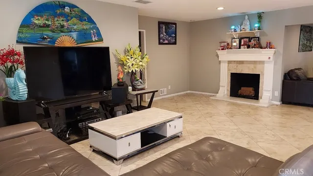 a bathroom with a shower curtain and window