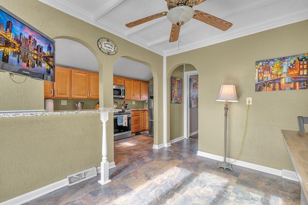 979 Seventh Street Beaver, PA 15009 - Photo 13 of 47 a view of a livingroom with furniture and a chandelier fan