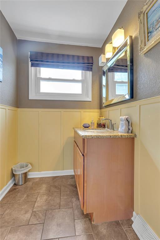 979 Seventh Street Beaver, PA 15009 - Photo 22 of 47 a bathroom with a sink a vanity and a mirror