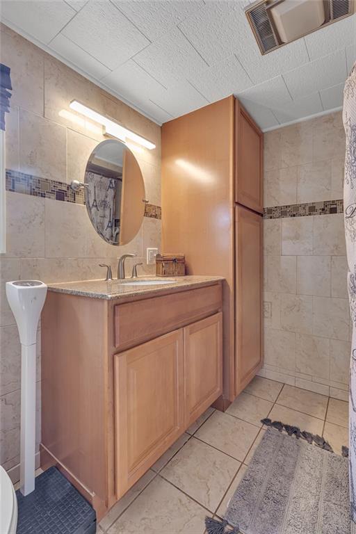 979 Seventh Street Beaver, PA 15009 - Photo 36 of 47 a bathroom with a sink and a mirror