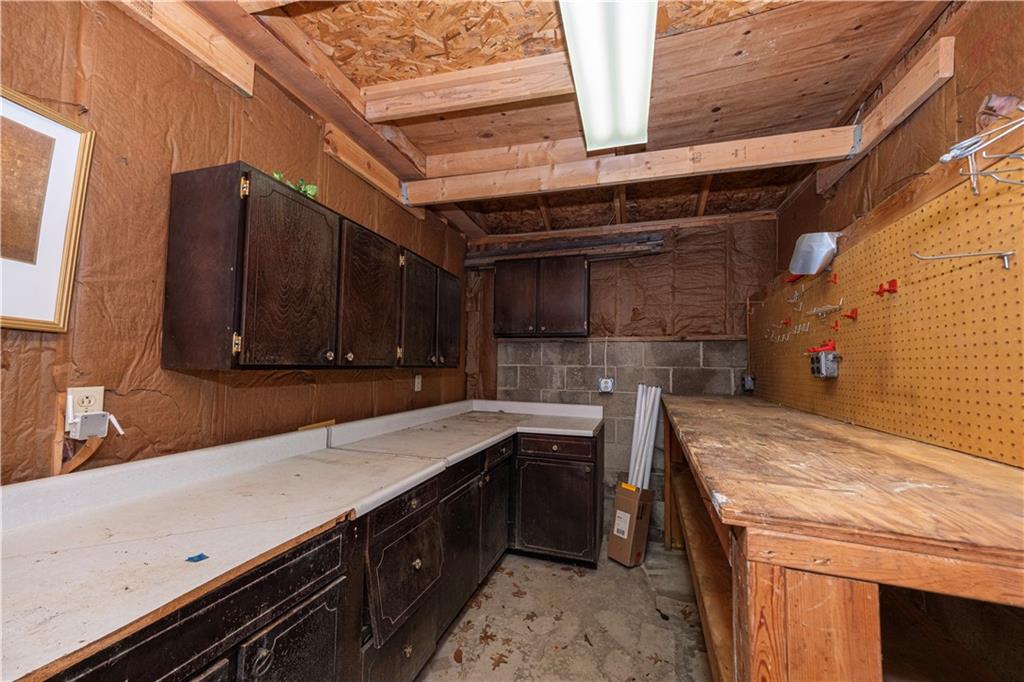 979 Seventh Street Beaver, PA 15009 - Photo 46 of 47 a kitchen with a sink and cabinets
