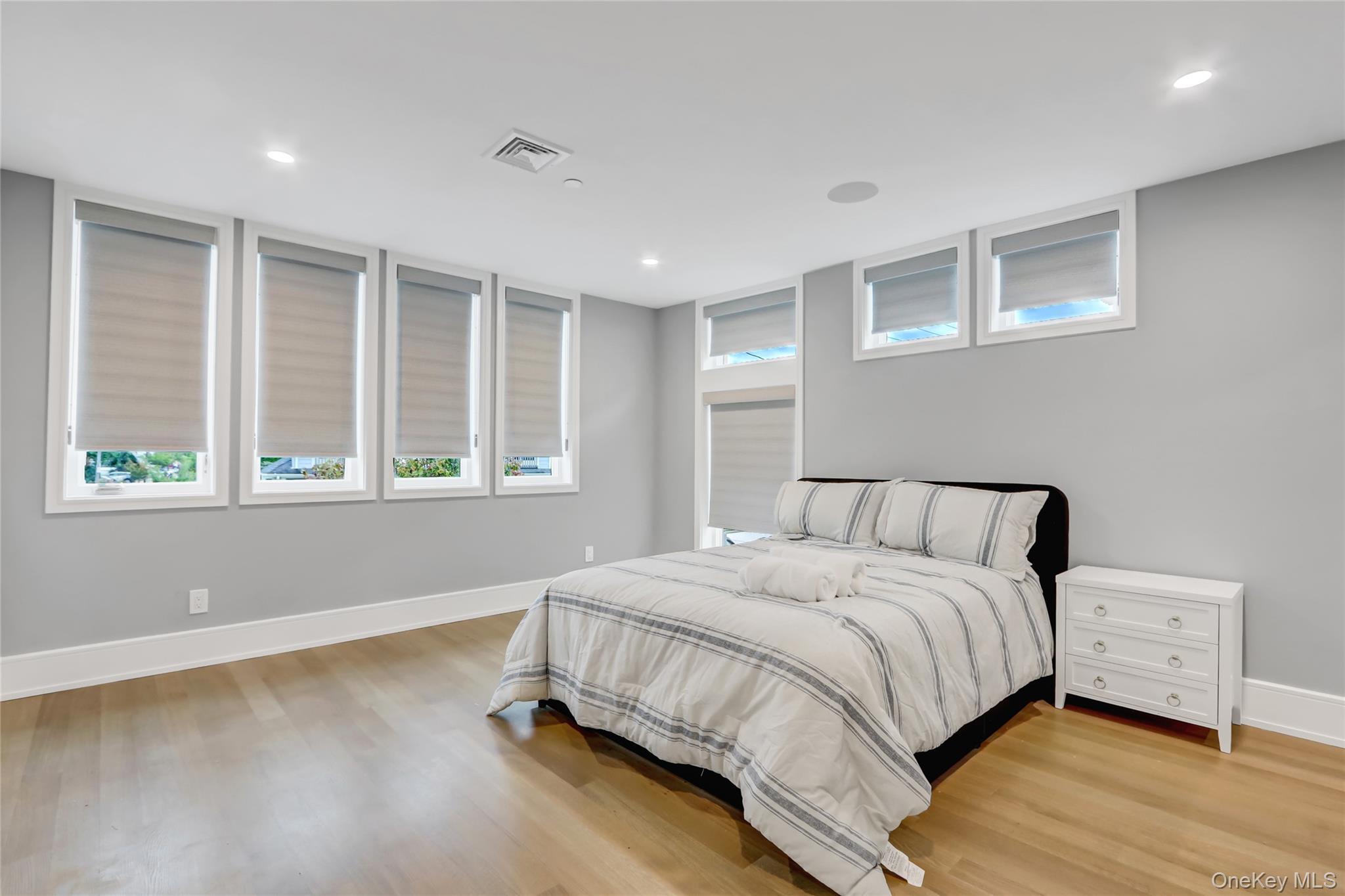 44 Bayside Drive Point Lookout, NY 11569 - Photo 21 of 47 a bedroom with a bed and a window