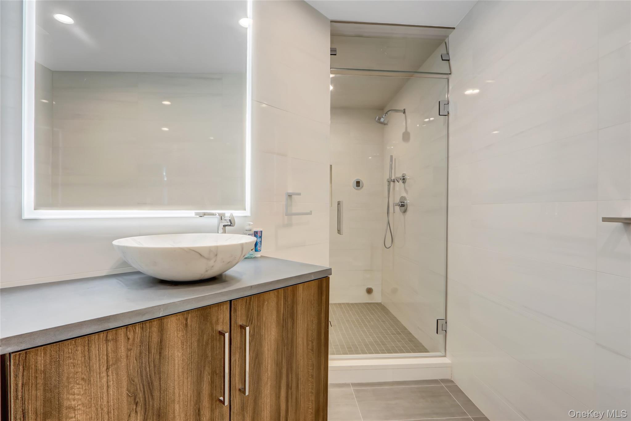 44 Bayside Drive Point Lookout, NY 11569 - Photo 29 of 47 a bathroom with a shower and a sink