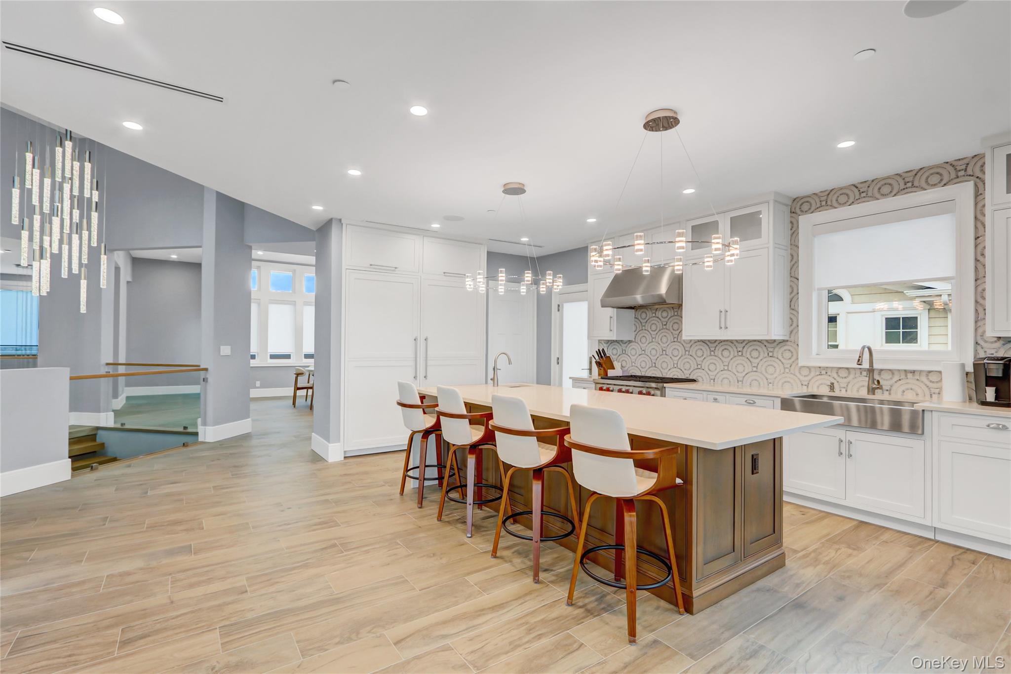 44 Bayside Drive Point Lookout, NY 11569 - Photo 36 of 47 a large kitchen with lots of counter space and chairs