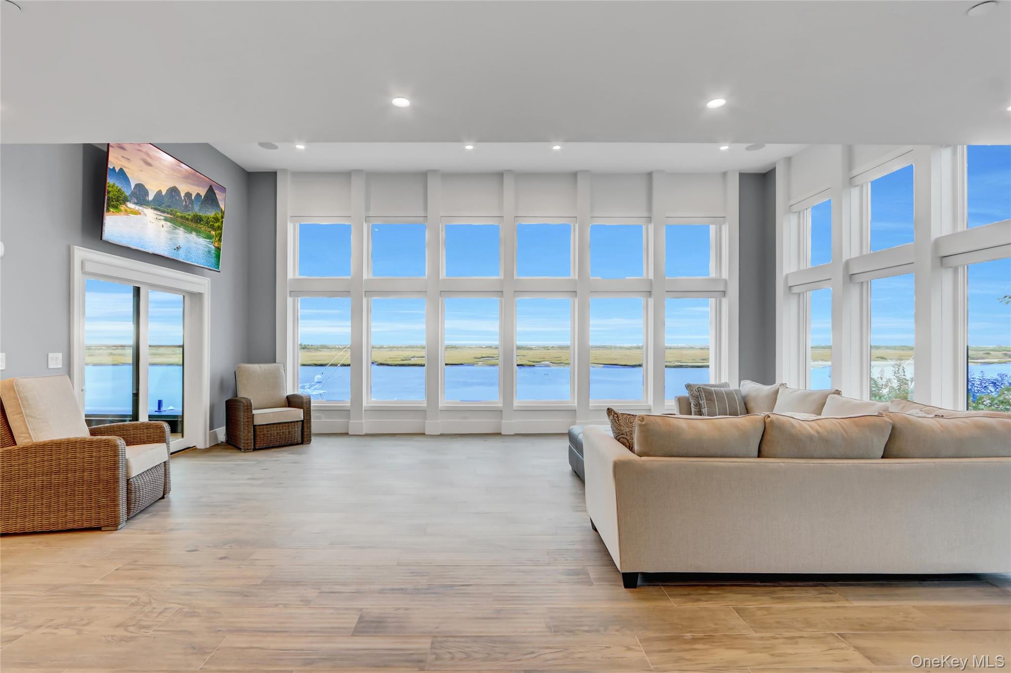 44 Bayside Drive Point Lookout, NY 11569 - Photo 38 of 47 a living room with furniture and a large window