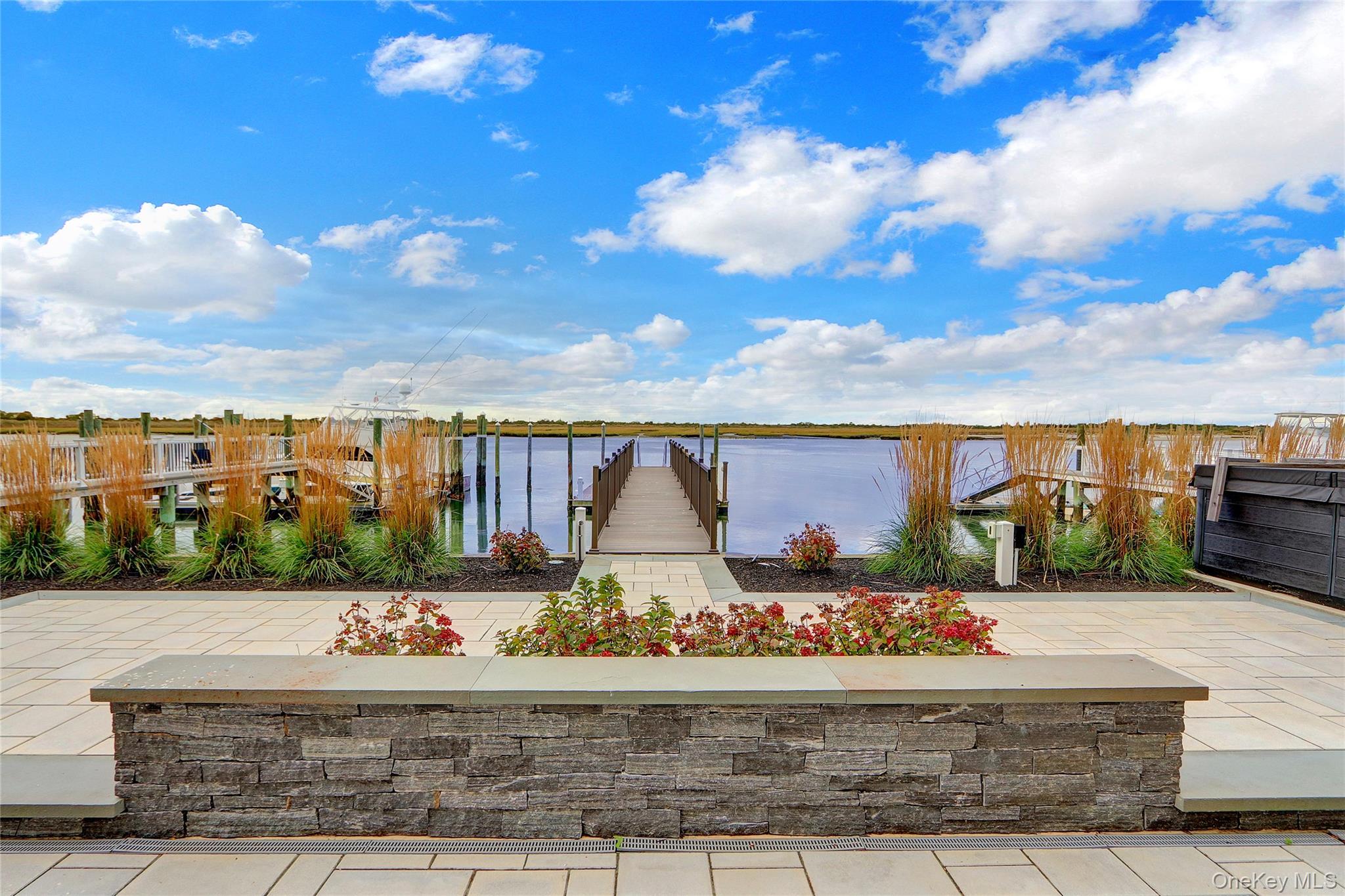 44 Bayside Drive Point Lookout, NY 11569 - Photo 8 of 47 View of patio / terrace with a water view of Reynolds Channel