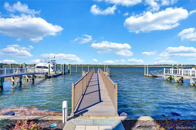 an aerial view of a house with outdoor space swimming pool