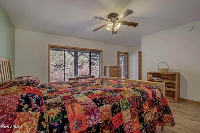 a view of a city with lush green forest