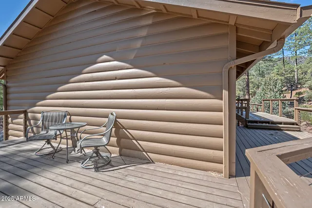 a room with furniture and flat screen tv