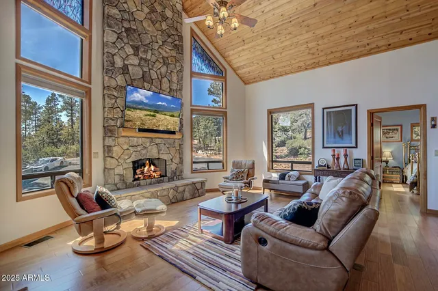 a view of a fireplace and wooden floor