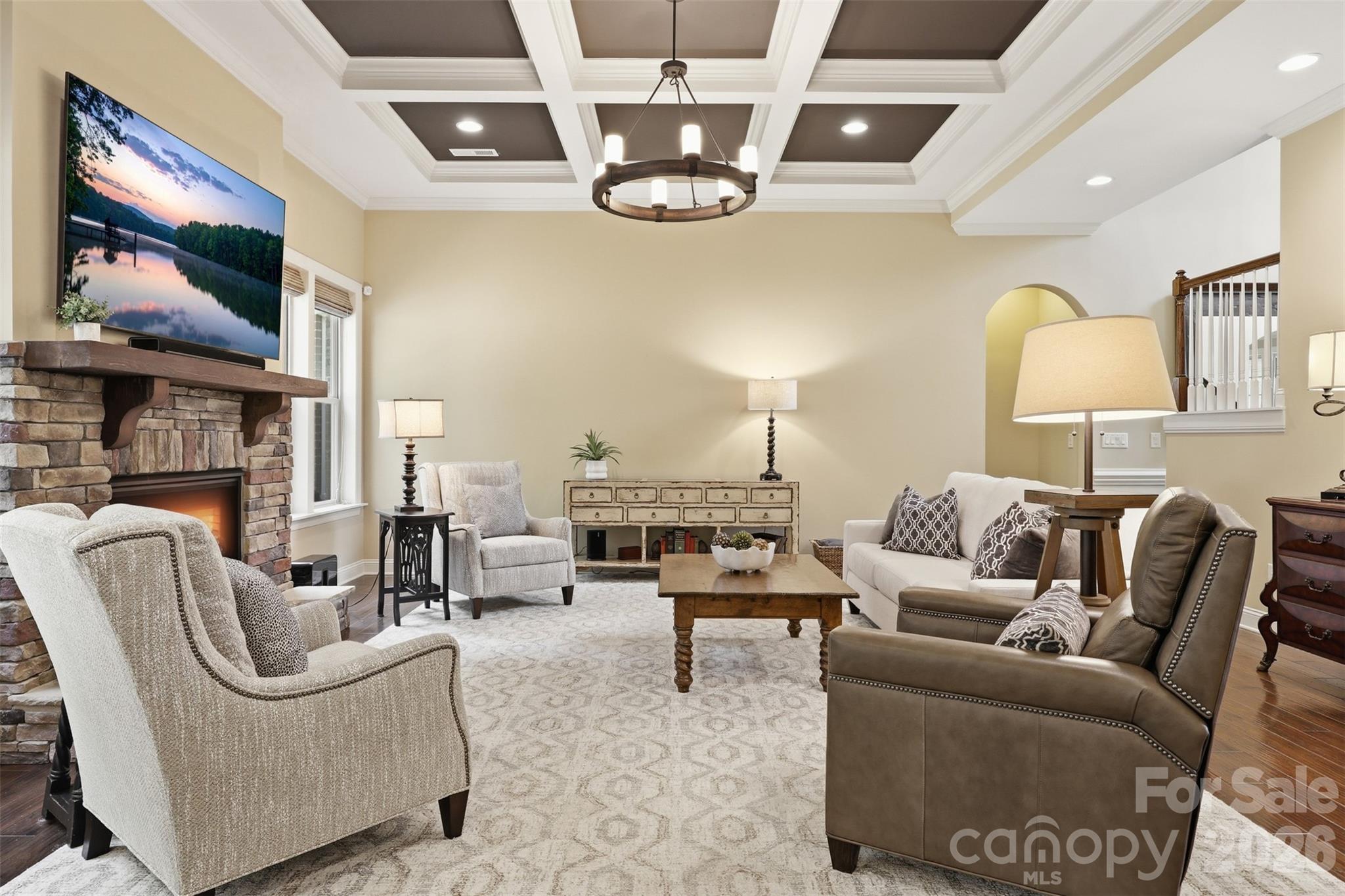 8094 Clems Branch Road Indian Land, SC 29707 - Photo 5 of 38 a living room with furniture a chandelier and a chandelier