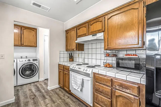a view of a bathroom from a hallway