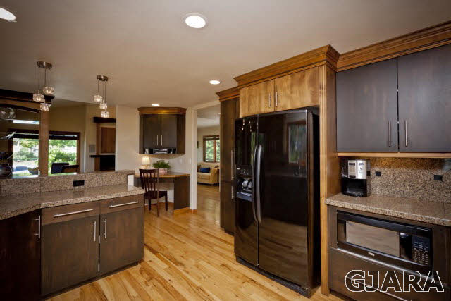 2638 H Road Grand Junction, CO 81506 - Photo 12 of 36 a kitchen with a refrigerator sink and stove