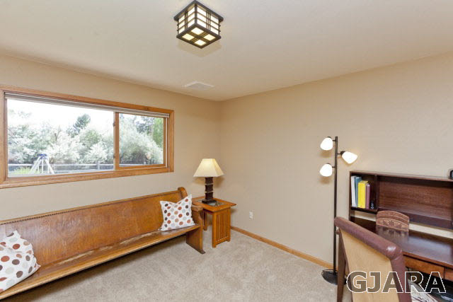 2638 H Road Grand Junction, CO 81506 - Photo 19 of 36 a bedroom with furniture and a window