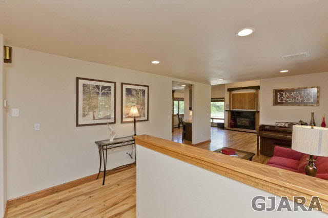 2638 H Road Grand Junction, CO 81506 - Photo 2 of 36 a living room with furniture and a wooden floor