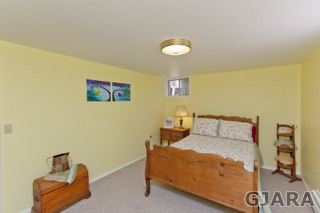 2638 H Road Grand Junction, CO 81506 - Photo 24 of 36 a bed room with a bed and a couch