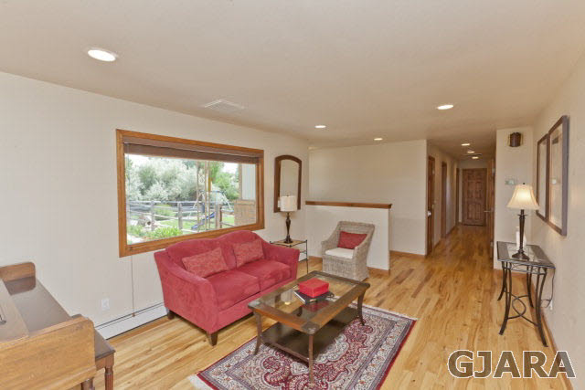 2638 H Road Grand Junction, CO 81506 - Photo 3 of 36 a living room with furniture and a window