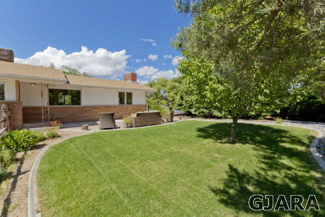 2638 H Road Grand Junction, CO 81506 - Photo 31 of 36 a front view of house with yard and green space