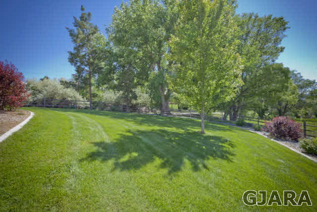 2638 H Road Grand Junction, CO 81506 - Photo 34 of 36 a view of a park with a bench