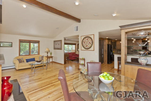 2638 H Road Grand Junction, CO 81506 - Photo 7 of 36 a living room with furniture and a clock