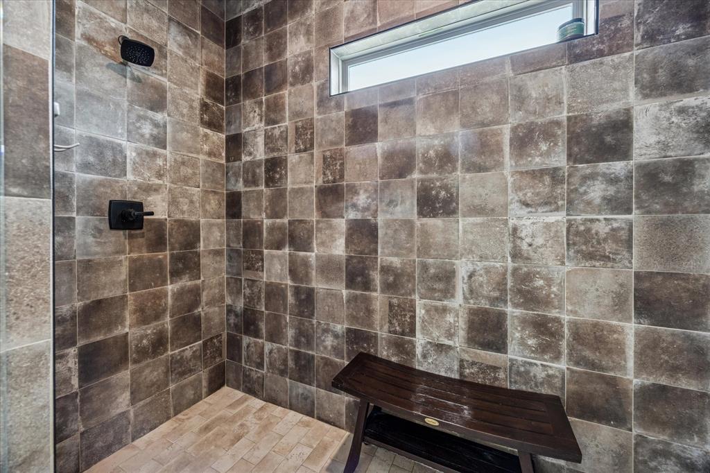 2028 Carrie Court Weatherford, TX 76088 - Photo 22 of 40 a bathroom with a shower