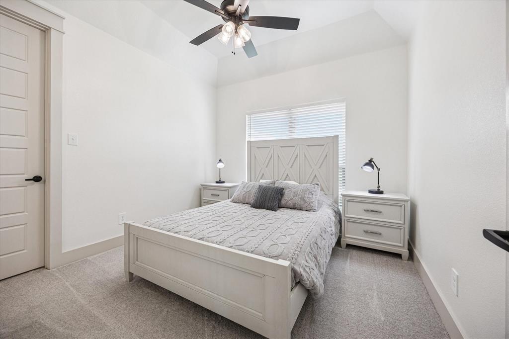 2028 Carrie Court Weatherford, TX 76088 - Photo 34 of 40 a bedroom with a bed and window