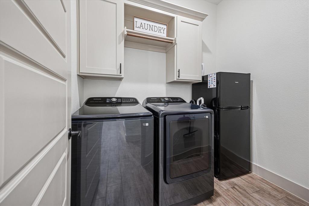 2028 Carrie Court Weatherford, TX 76088 - Photo 35 of 40 a room with storage and utility