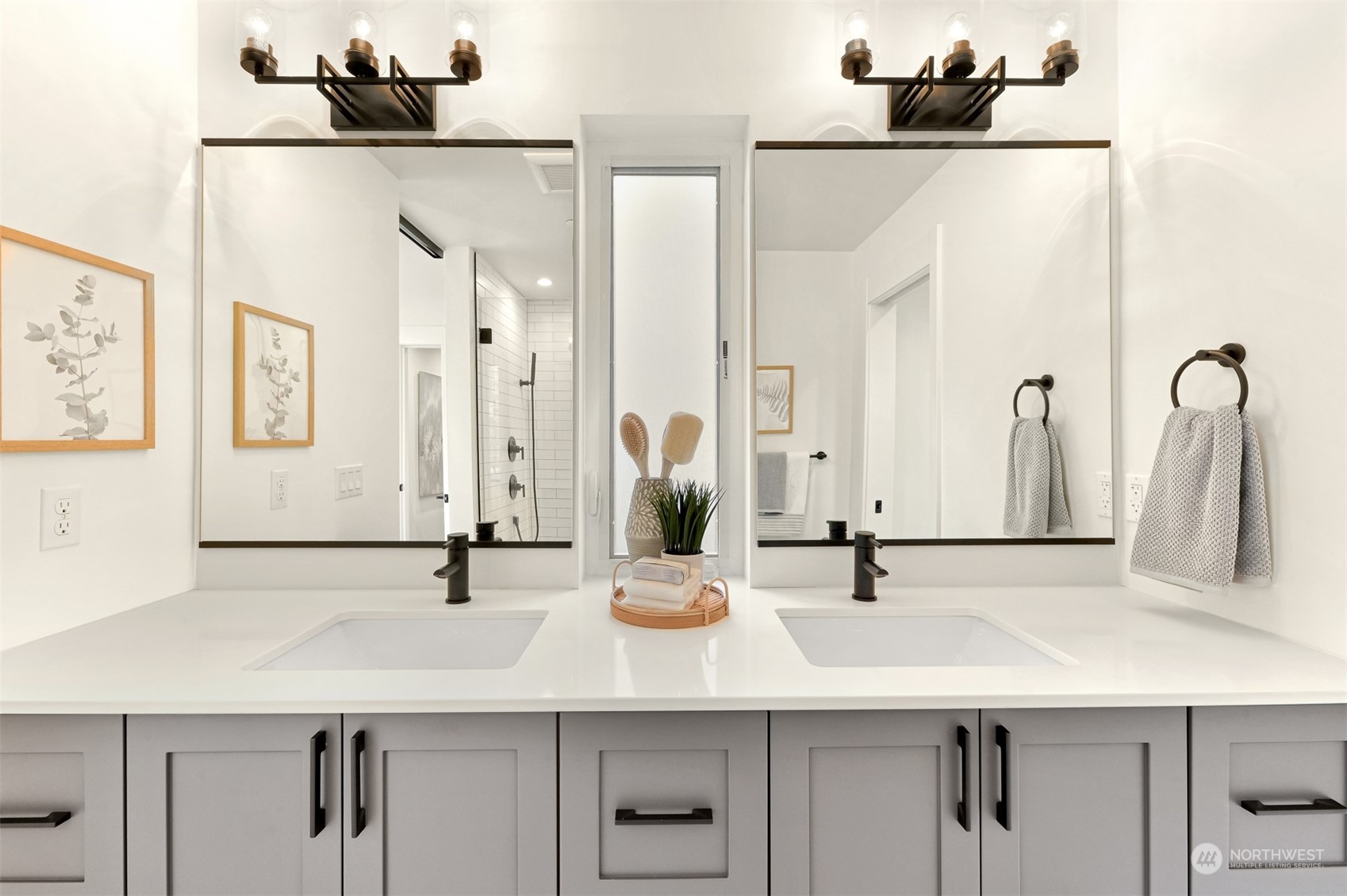 422 14th Avenue East, Unit B Seattle, WA 98112 - Photo 18 of 24 a bathroom with a sink and a mirror