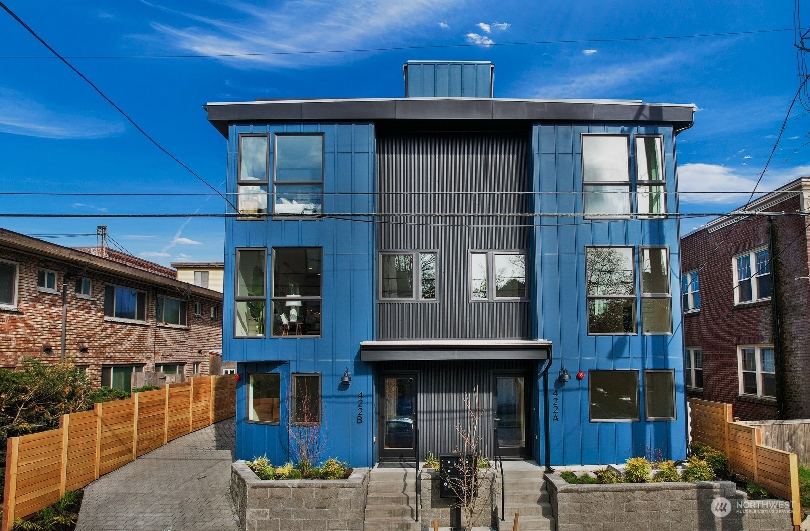 422 14th Avenue East, Unit B Seattle, WA 98112 - Photo 2 of 24 a front view of a building with balcony