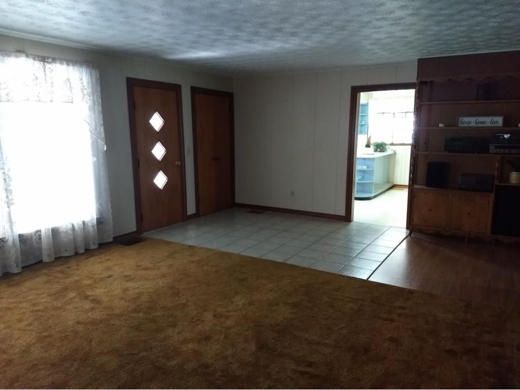 149 Helan Adams Road Dryden, VA 24243 - Photo 13 of 23 LIVING ROOM TOWARDS FRONT DOOR