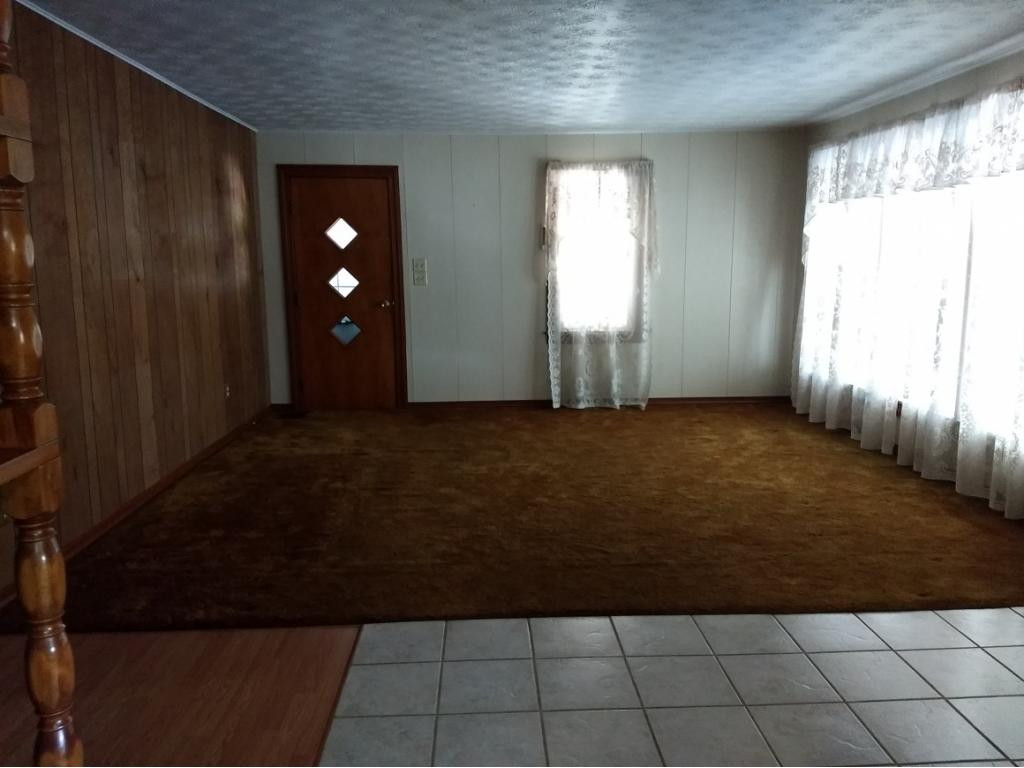 149 Helan Adams Road Dryden, VA 24243 - Photo 14 of 23 LIVING ROOM TOWARDS SIDE DOOR