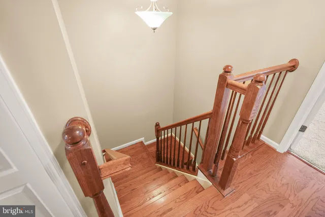 a view of a balcony with wooden floor
