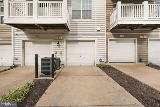 a front view of a house with stairs