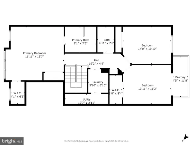 a front view of a house with a yard table and chairs