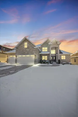 a view of a house with a street