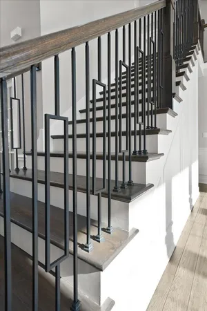 a view of a hallway with seating area