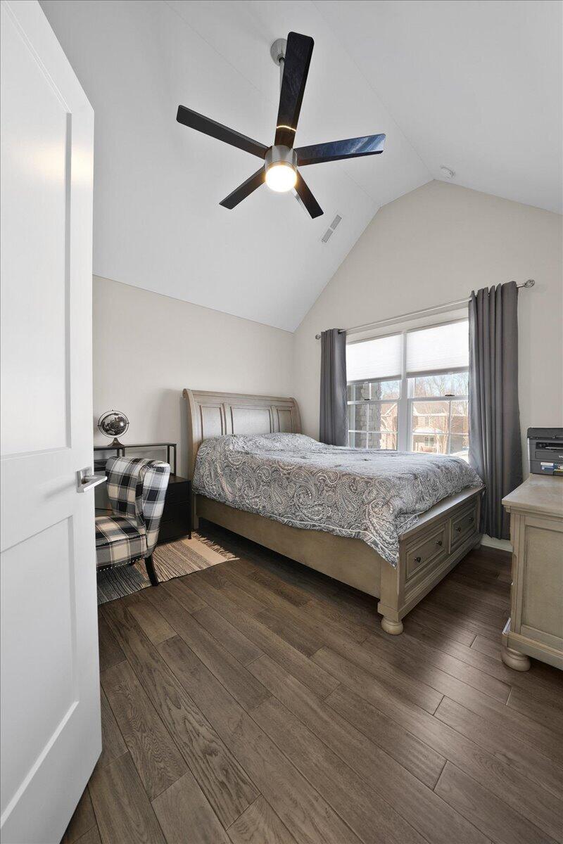 9317 Michigan Drive Crown Point, IN 46307 - Photo 17 of 42 a bedroom with a bed and a window