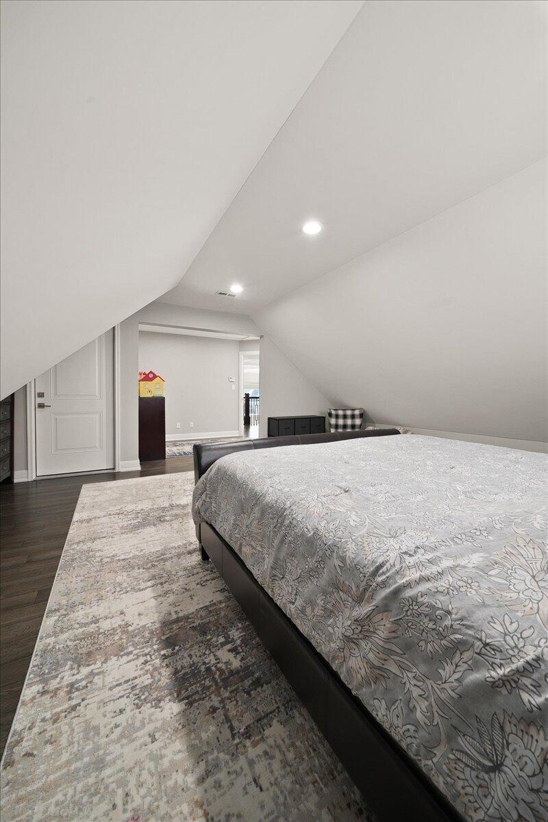 9317 Michigan Drive Crown Point, IN 46307 - Photo 18 of 42 a bedroom with a large bed and a couch